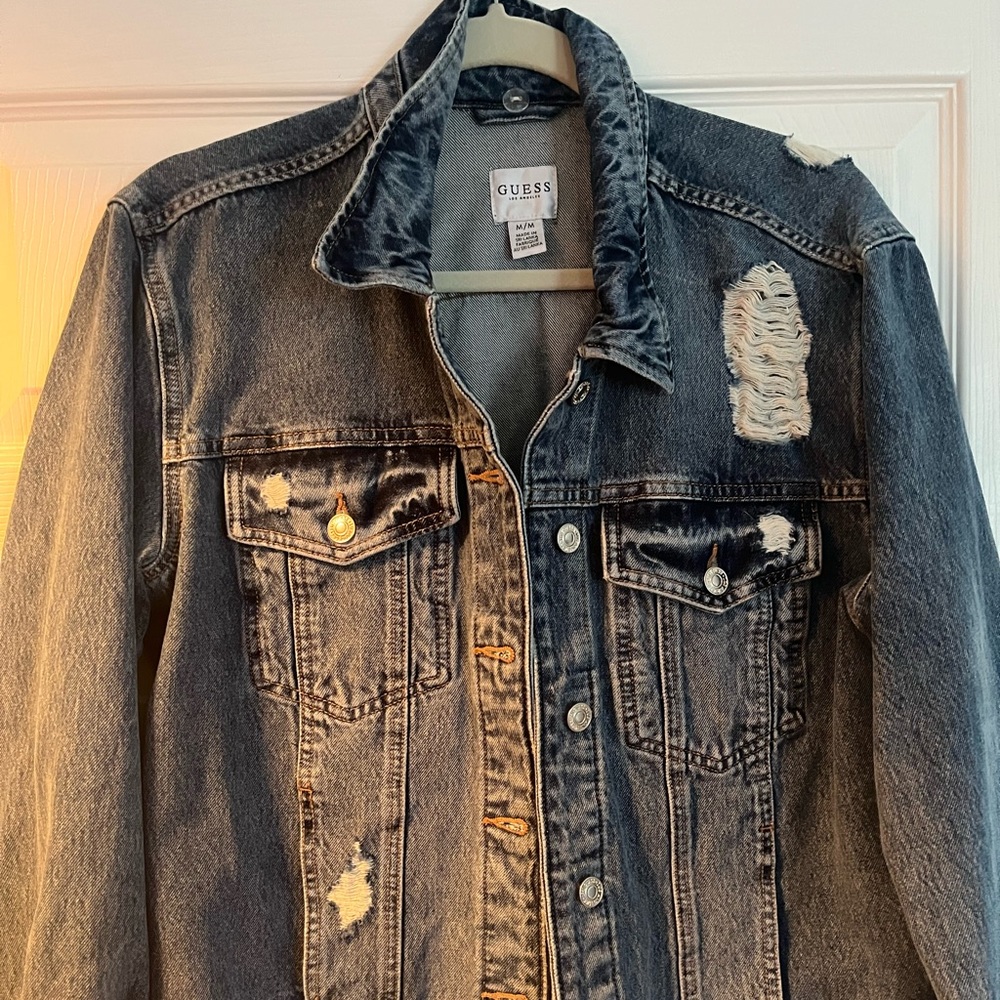 GUESS Denim jean jacket size medium. slightly distressed